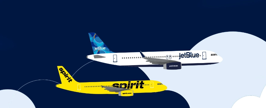 There are two JetBlue + Spirit airplanes in the photo